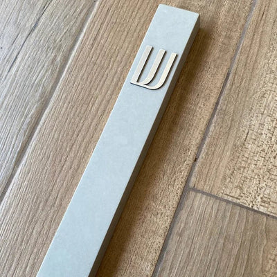 A design sign for a door made of clean concrete in gray with silver lettering - Israel series (Copy)  Door Sign + Mezuzah Case