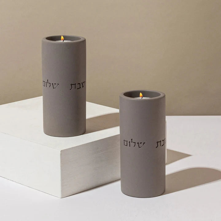 A pair of clean concrete candlehold for sitting in classic shades - Concrete Flow Series (Copy) 