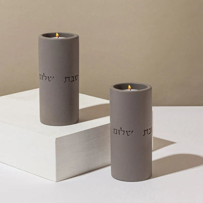 A pair of clean concrete candlehold for sitting in classic shades - Concrete Flow Series (Copy) 