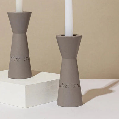 A pair of clean concrete Sabbath Candleholders in classic shades - Aura series 