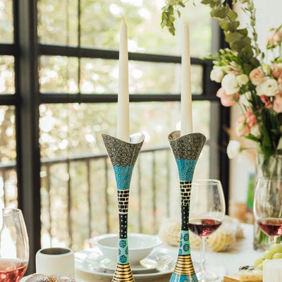 Candleholders designed from hand-cast aluminum in red, Premium Curved series 