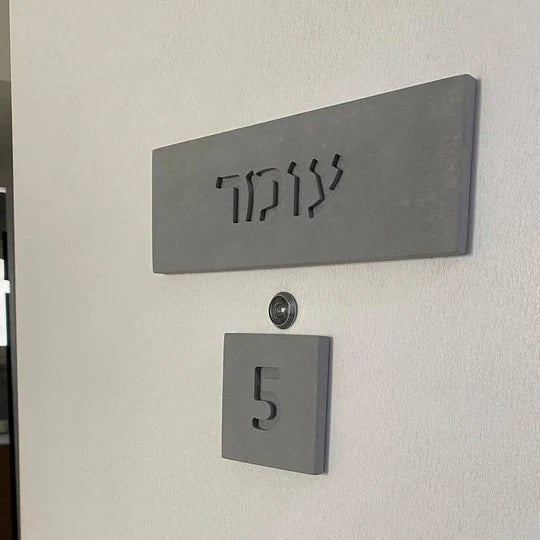 A spectacular home sign with a personalized design made of natural gray concrete with engraving - Concrete Chic series 