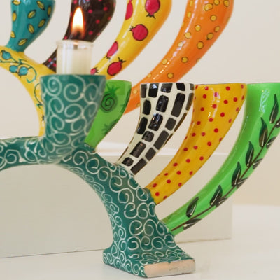 A luxurious and functional menorah – that easily transforms into a designer Candleholder– Twist series