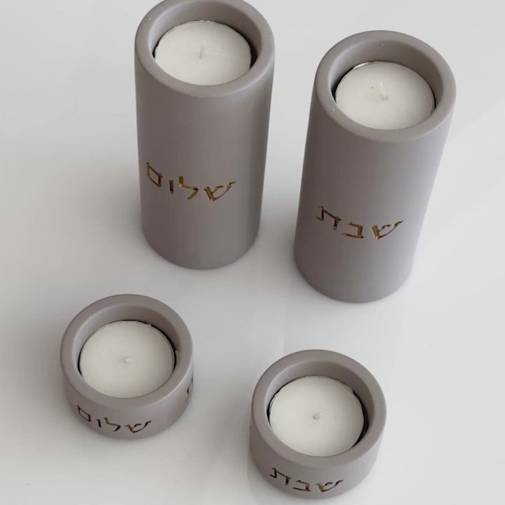 A pair of natural concrete candleholder for sitting in impressive colors - model - Concrete Gold