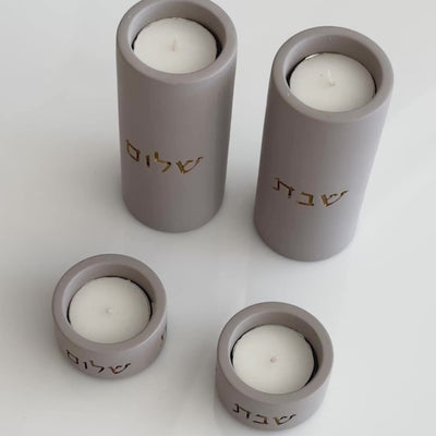 A pair of natural concrete candleholder for sitting in impressive colors - model - Concrete Gold